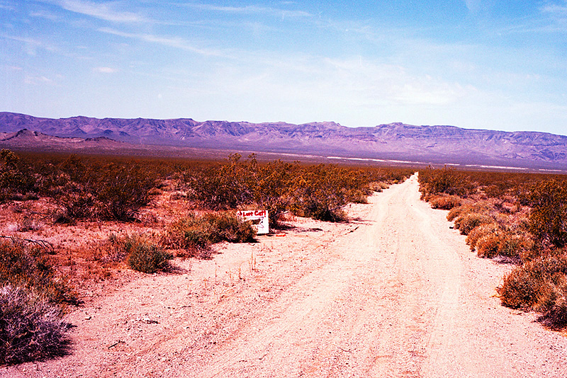 lost cat sign on remote desert dirt road