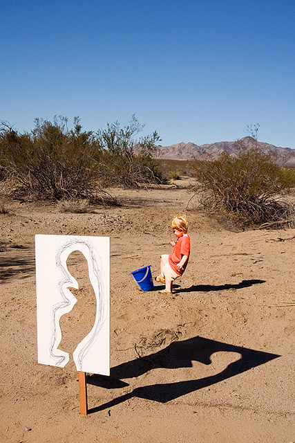cutout of toddler in front of him kicking the bucket 