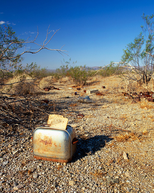 vintage toaster on desert floor